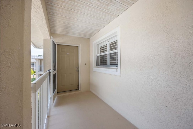 733 Landover Ct Unit 203, Naples, FL 34104 - property entrance featuring stucco siding