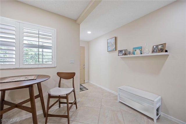 733 Landover Ct Unit 203, Naples, FL 34104 - sitting room with baseboards, recessed lighting, and light tile patterned floors