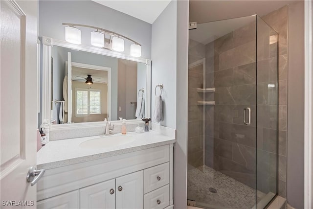 733 Landover Ct Unit 203, Naples, FL 34104 - full bath featuring vanity, a stall shower, and ceiling fan