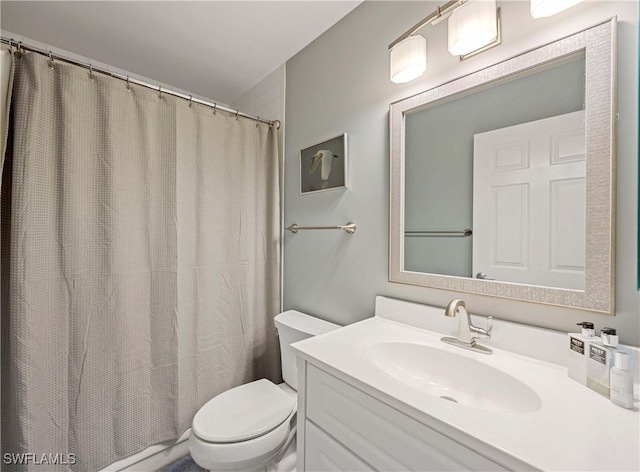 733 Landover Ct Unit 203, Naples, FL 34104 - full bathroom featuring toilet, vanity, and a shower with shower curtain