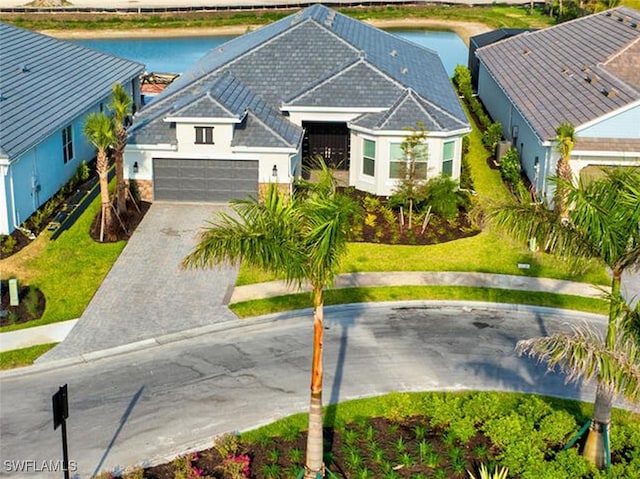 15766 Cortina St, Naples, FL 34114 - view of subject property featuring a large body of water
