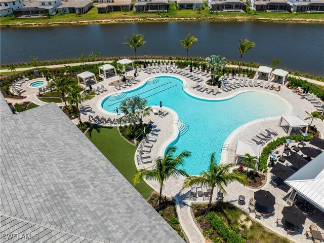 15766 Cortina St, Naples, FL 34114 - community pool featuring a water view and a residential view