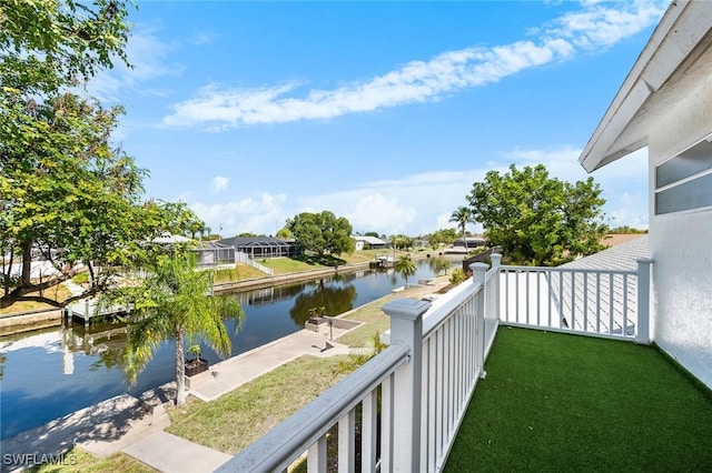 balcony featuring a water view