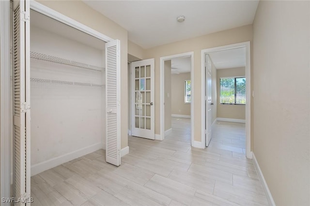 interior space featuring baseboards
