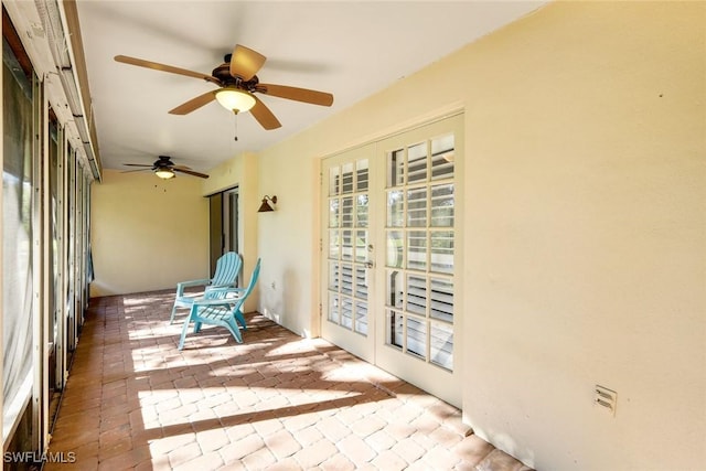 unfurnished sunroom with french doors