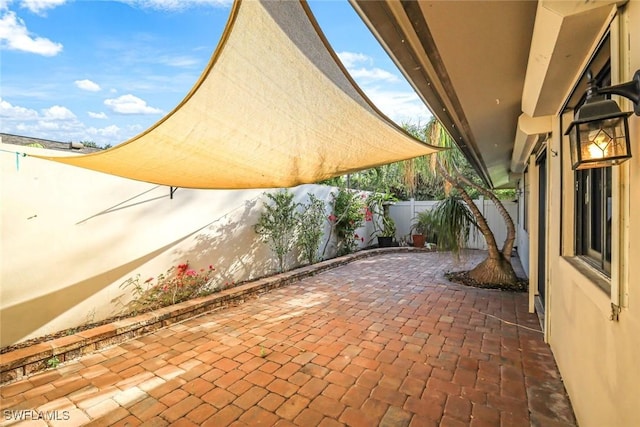 view of patio with a fenced backyard