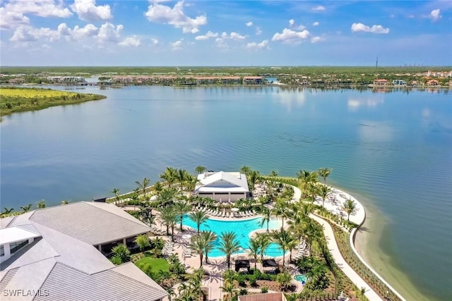 birds eye view of property with a water view