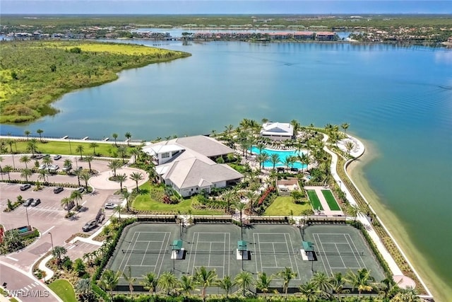 birds eye view of property featuring a water view