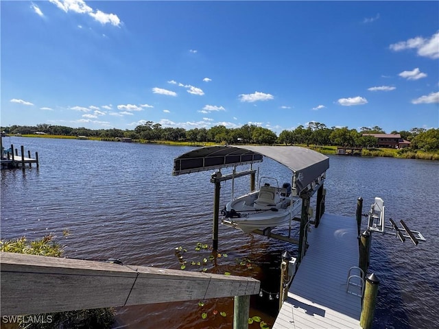 270 River Oaks Dr, Labelle, FL 33935 - dock area with boat lift and a water view