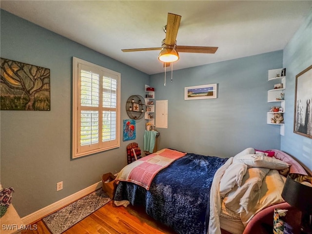 270 River Oaks Dr, Labelle, FL 33935 - bedroom with wood finished floors, baseboards, and ceiling fan