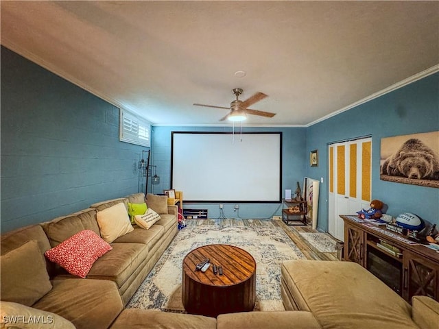 270 River Oaks Dr, Labelle, FL 33935 - cinema room featuring concrete block wall, a ceiling fan, wood finished floors, and ornamental molding