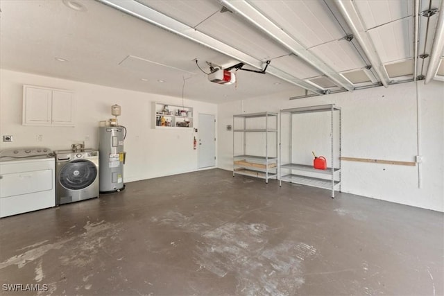 garage featuring electric water heater, washing machine and dryer, and a garage door opener