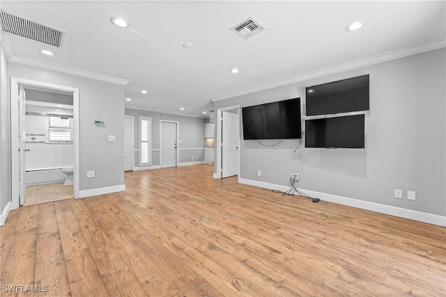 unfurnished living room featuring crown molding, recessed lighting, light wood-style flooring, and baseboards