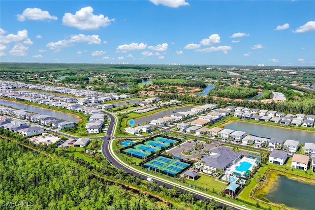 birds eye view of property featuring a water view and a residential view