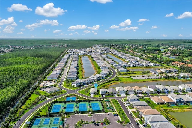 bird's eye view with a water view and a residential view
