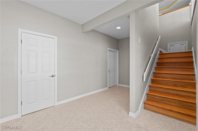 21075 Saint Peters Dr S, Fort Myers Beach, FL 33931 - stairs with baseboards, recessed lighting, and tile patterned floors