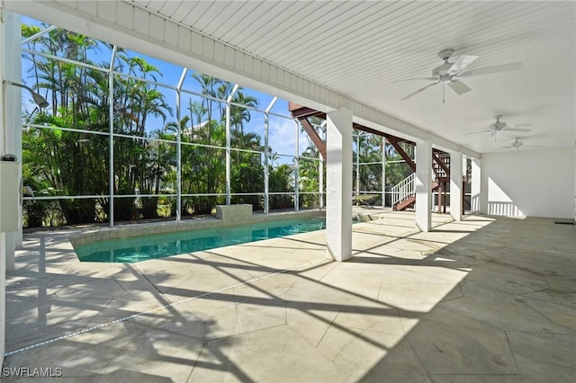 21075 Saint Peters Dr S, Fort Myers Beach, FL 33931 - outdoor pool featuring stairway, a patio area, ceiling fan, and a lanai