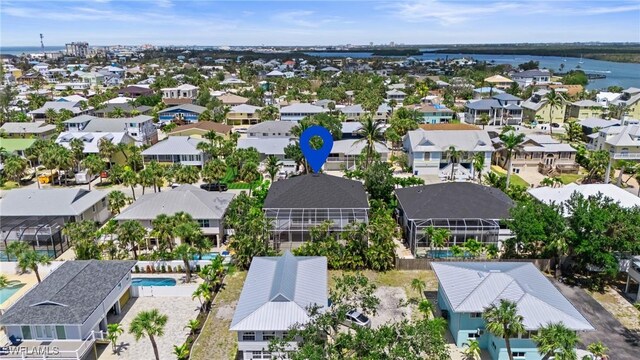 21075 Saint Peters Dr S, Fort Myers Beach, FL 33931 - aerial perspective of suburban area featuring a nearby body of water and a pool area