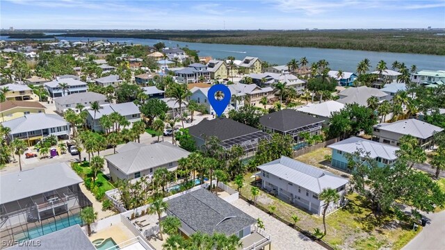 21075 Saint Peters Dr S, Fort Myers Beach, FL 33931 - aerial view of residential area featuring a nearby body of water
