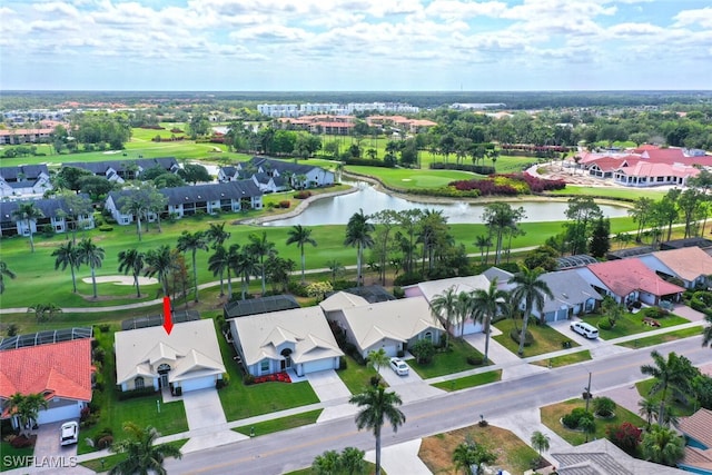 522 Countryside Dr, Naples, FL 34104 - birds eye view of property featuring view of golf course, a residential view, and a water view