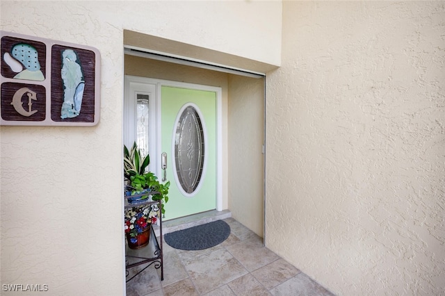 522 Countryside Dr, Naples, FL 34104 - entrance to property featuring stucco siding