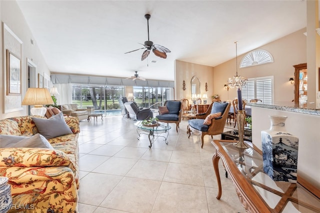 522 Countryside Dr, Naples, FL 34104 - living room featuring lofted ceiling, ceiling fan with notable chandelier, and light tile patterned floors