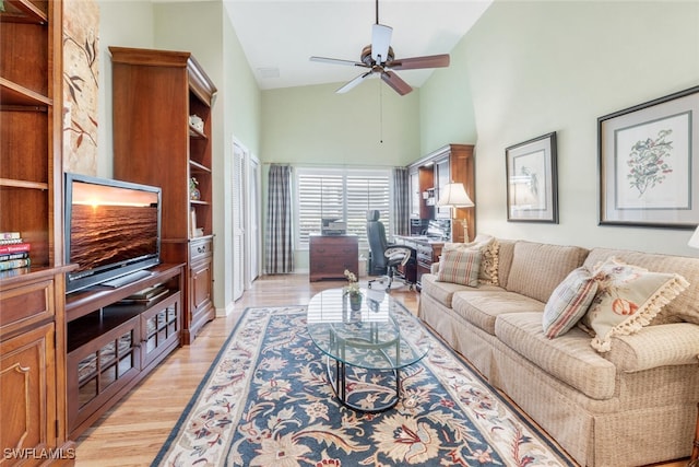 522 Countryside Dr, Naples, FL 34104 - living area featuring baseboards, light wood-type flooring, high vaulted ceiling, and ceiling fan