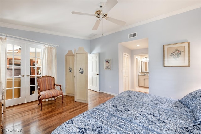 522 Countryside Dr, Naples, FL 34104 - bedroom with wood finished floors, visible vents, ornamental molding, french doors, and baseboards