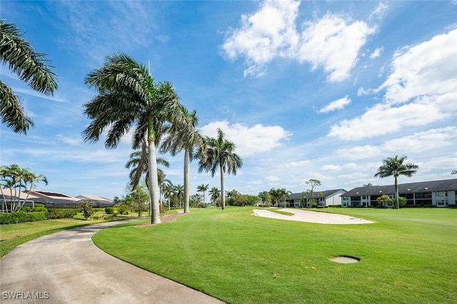 522 Countryside Dr, Naples, FL 34104 - view of property's community with a lawn, golf course view, and a residential view