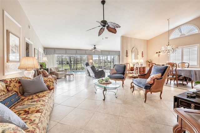 522 Countryside Dr, Naples, FL 34104 - living room featuring ceiling fan with notable chandelier, vaulted ceiling, light tile patterned floors, and a healthy amount of sunlight