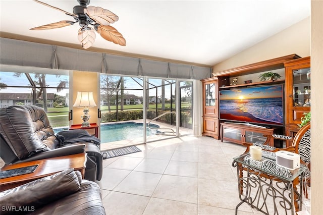 522 Countryside Dr, Naples, FL 34104 - living room featuring ceiling fan, lofted ceiling, light tile patterned flooring, and a sunroom