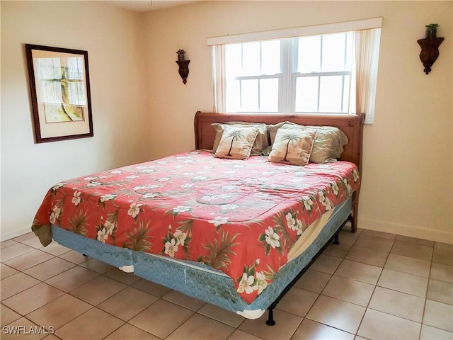 3706 Broadway Unit 5, Fort Myers, FL 33901 - tiled bedroom with baseboards