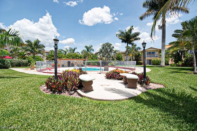 3706 Broadway Unit 5, Fort Myers, FL 33901 - exterior space featuring fence, a patio area, and a fenced in pool