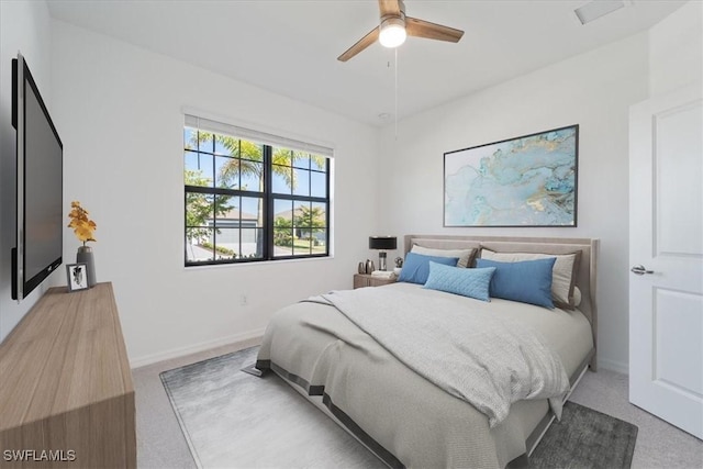 2161 Gardenia Ave, Port Charlotte, FL 33953 - bedroom featuring light colored carpet, baseboards, and a ceiling fan