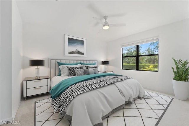2161 Gardenia Ave, Port Charlotte, FL 33953 - bedroom featuring light carpet, a ceiling fan, and baseboards