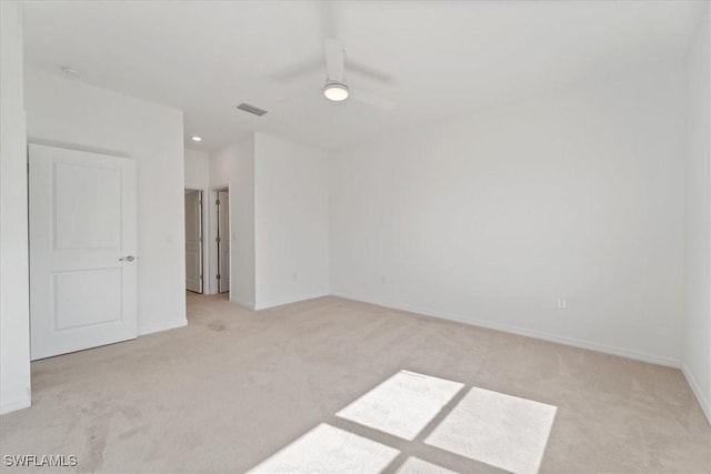 2161 Gardenia Ave, Port Charlotte, FL 33953 - empty room featuring light carpet, a ceiling fan, visible vents, and baseboards
