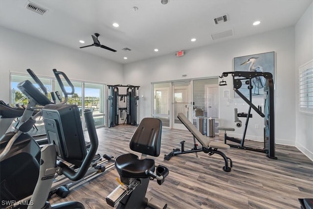2161 Gardenia Ave, Port Charlotte, FL 33953 - workout area featuring a ceiling fan, wood finished floors, visible vents, and recessed lighting