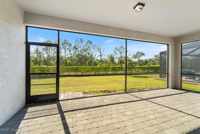 2161 Gardenia Ave, Port Charlotte, FL 33953 - unfurnished sunroom featuring a healthy amount of sunlight