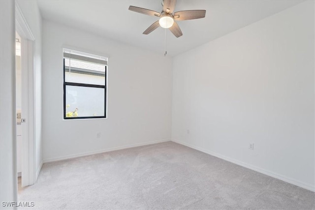 2161 Gardenia Ave, Port Charlotte, FL 33953 - unfurnished room featuring ceiling fan, baseboards, and light colored carpet