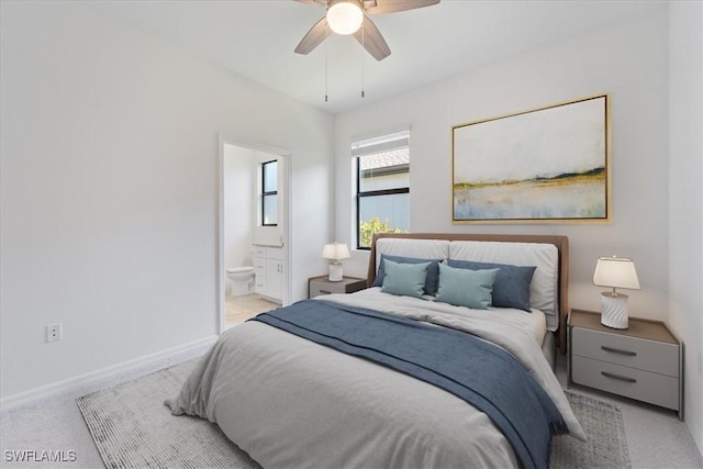 2161 Gardenia Ave, Port Charlotte, FL 33953 - bedroom with baseboards, a ceiling fan, carpet flooring, and ensuite bathroom