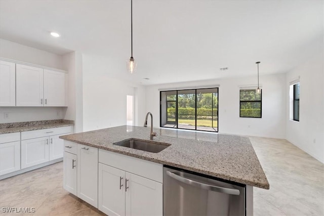 2161 Gardenia Ave, Port Charlotte, FL 33953 - kitchen featuring decorative light fixtures, stainless steel dishwasher, open floor plan, and a sink