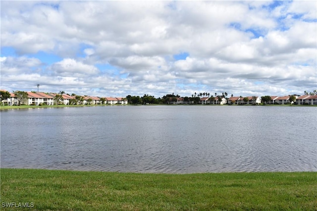view of water feature with a residential view