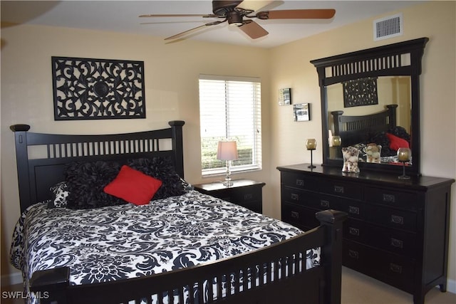 bedroom with a ceiling fan and visible vents