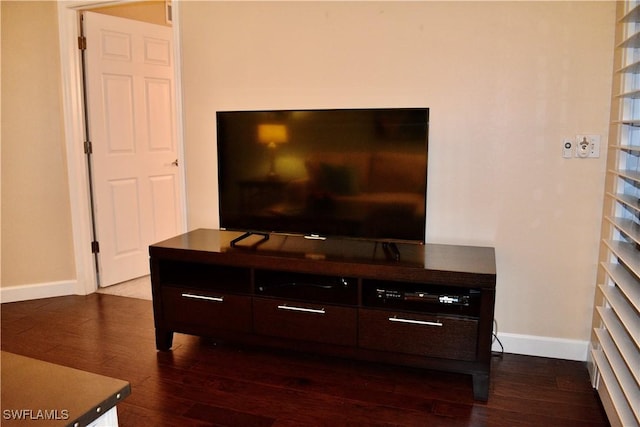 details with wood finished floors and baseboards