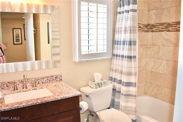bathroom with toilet, vanity, and shower / bath combination with curtain