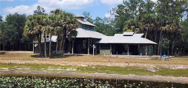 3105 Secretariat Dr, Labelle, FL 33935 - back of property with metal roof