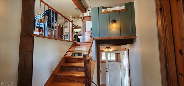 3105 Secretariat Dr, Labelle, FL 33935 - stairway with beam ceiling