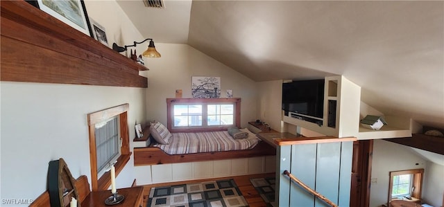 3105 Secretariat Dr, Labelle, FL 33935 - interior space with visible vents, wood finished floors, lofted ceiling, and a fireplace