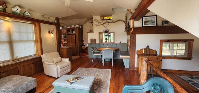 3105 Secretariat Dr, Labelle, FL 33935 - living area with vaulted ceiling and wood finished floors