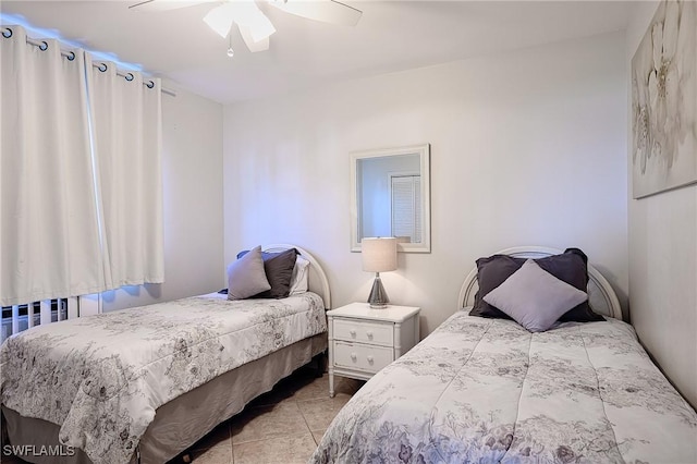 240 N Collier Blvd Unit G1, Marco Island, FL 34145 - bedroom featuring light tile patterned flooring and a ceiling fan